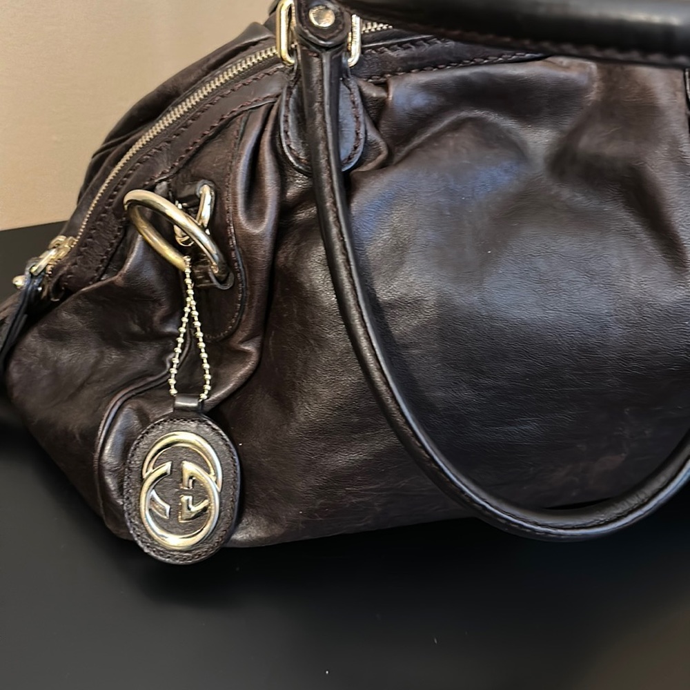 Pre Owners Gucci dark brown handbag